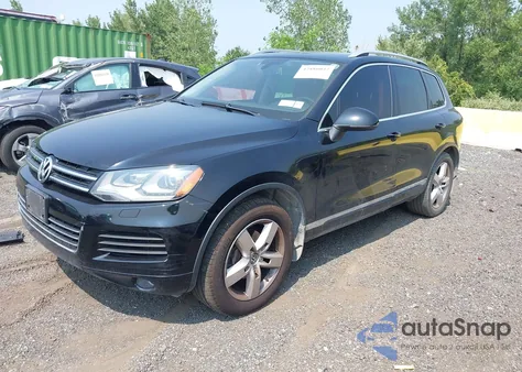 2014 Volkswagen Touareg Tdi Lux z USA, uszkodzony, nr VIN WVGEP9BP2ED005566